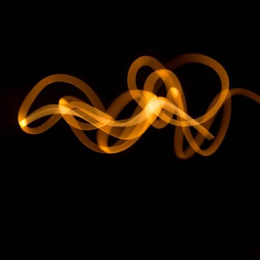Abstract light trails in a dark studio, representing creative photography